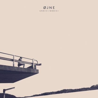 Covert of the Øjne "Undici/Dodici" 12" EP showing a person leaning on a railing of an elevated platform with a vast, open sky in the background.