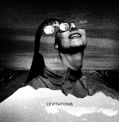 B/W cover of Levitations "Dust" LP showing a women's face with sunglasses, smiling to the sun.